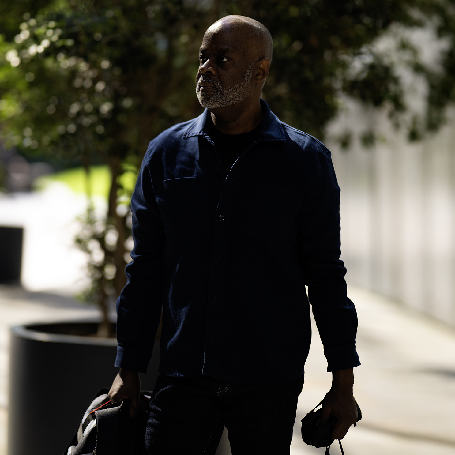 Nigel Ryan at work in the field, camera in hand
